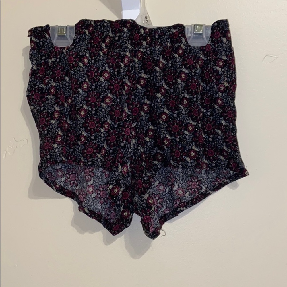 Loose floral shorts.